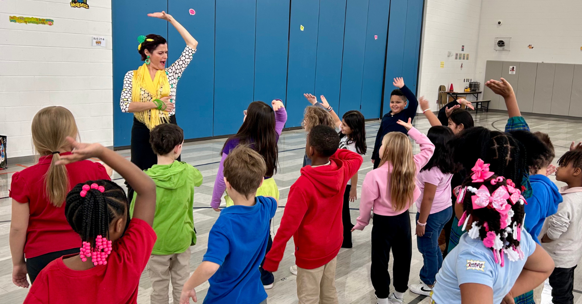 students and teacher dancing flamenco